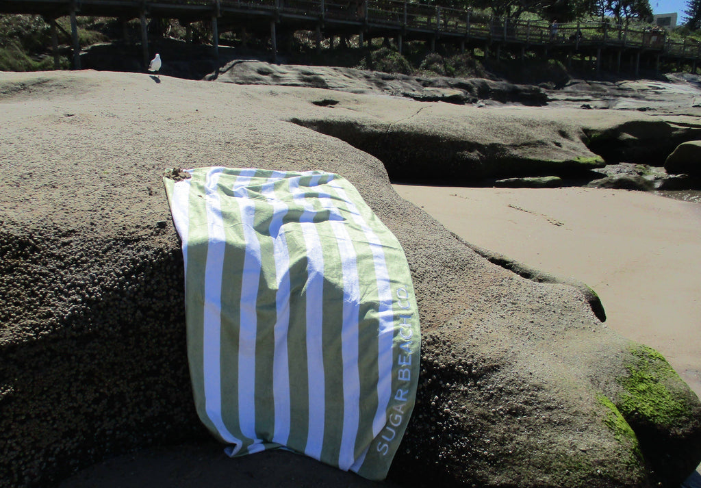 Beach Towel lying on the rocks