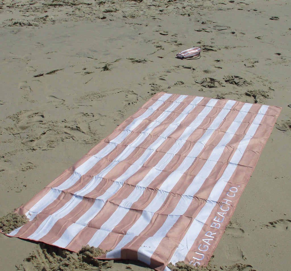 Towel lying on the sand